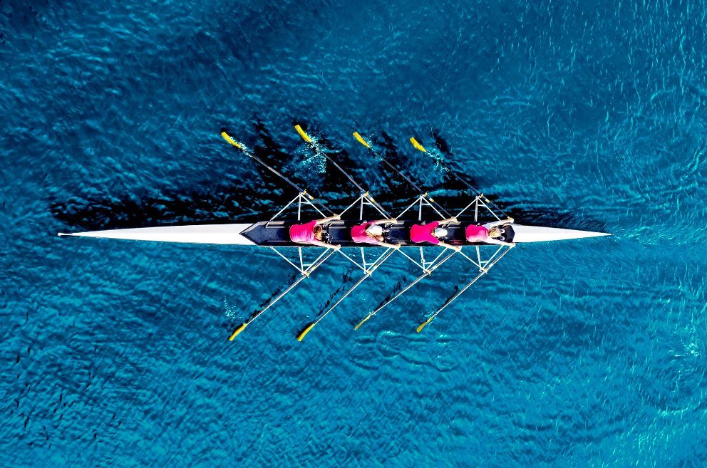 The rowing team practices on the river.